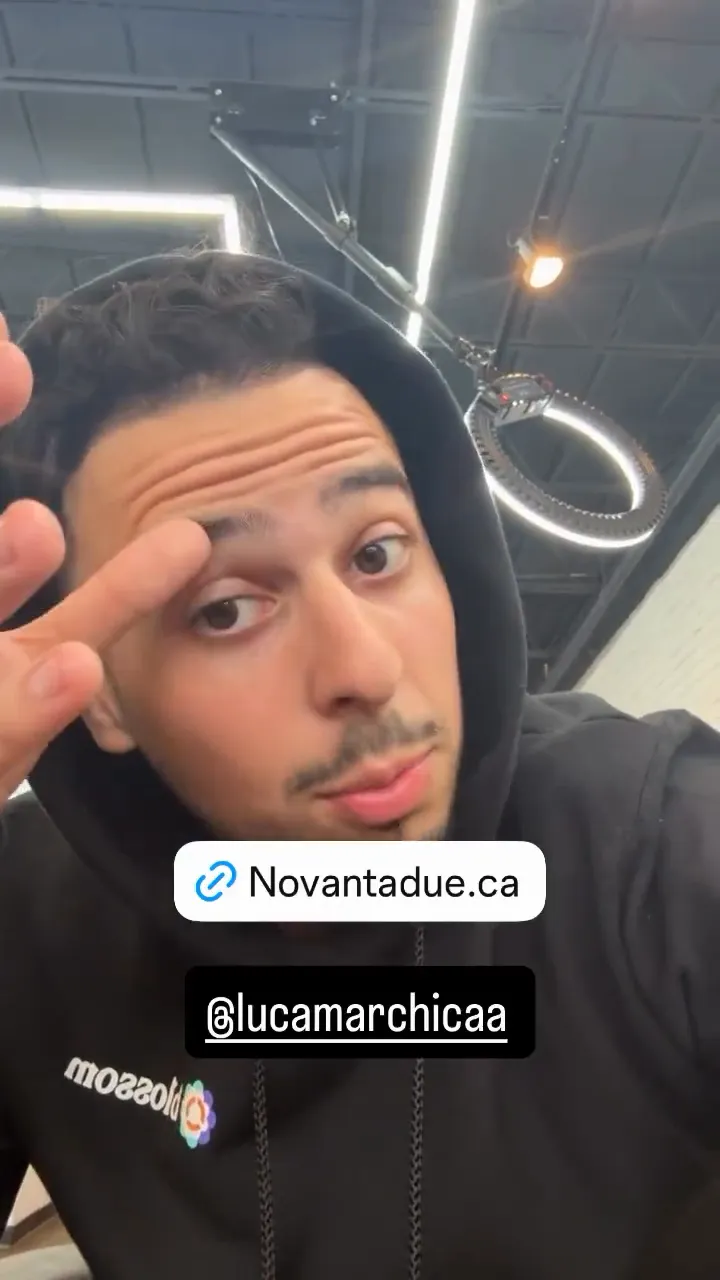 Juliano, owner of Salon NovantaDue, in his video review, standing in the salon